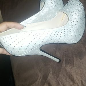 Silver rhinestone pumps